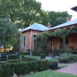 The beautiful entry to Elm framed beautifully by the tranquil gardens.