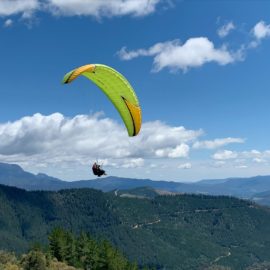 Tandem Paraglide over Mystic Mountain