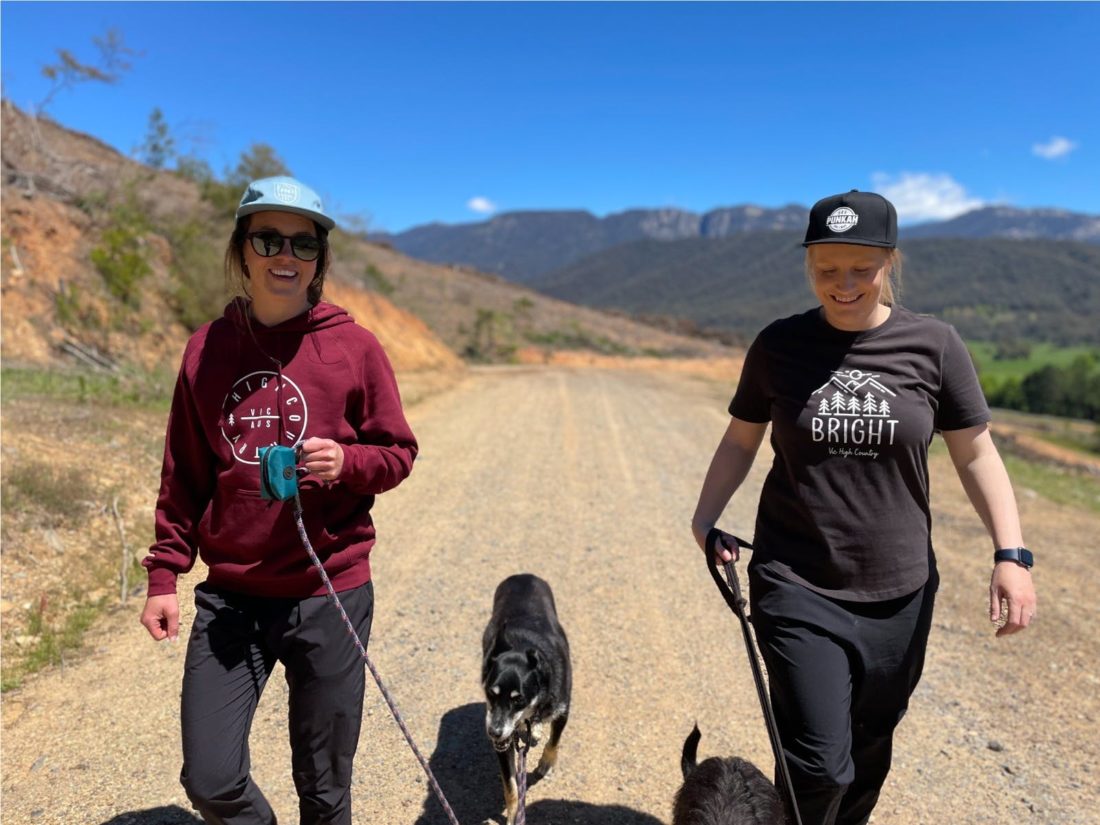 Two ladies walking their dogs in the high country